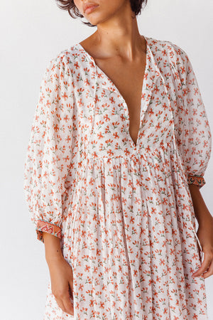 Daughters of India Kyra Maxi Dress in Coral — studio close-up V-neckline and gathered waist, coral floral block print