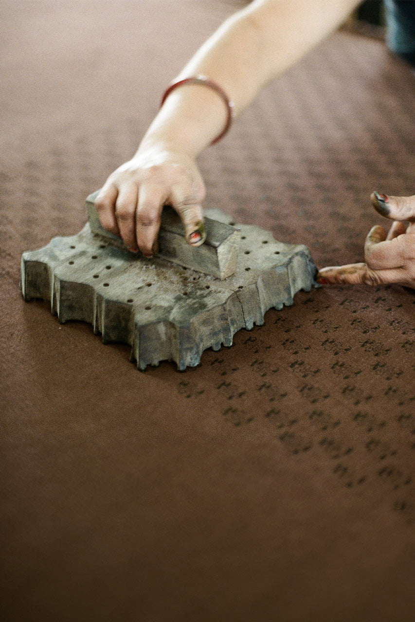 Sundress Mini Almond — artisan workshop Jaipur India, handloom craftsperson block printing almond cotton fabric, ethical slow fashion making process, traditional block print | Daughters of India