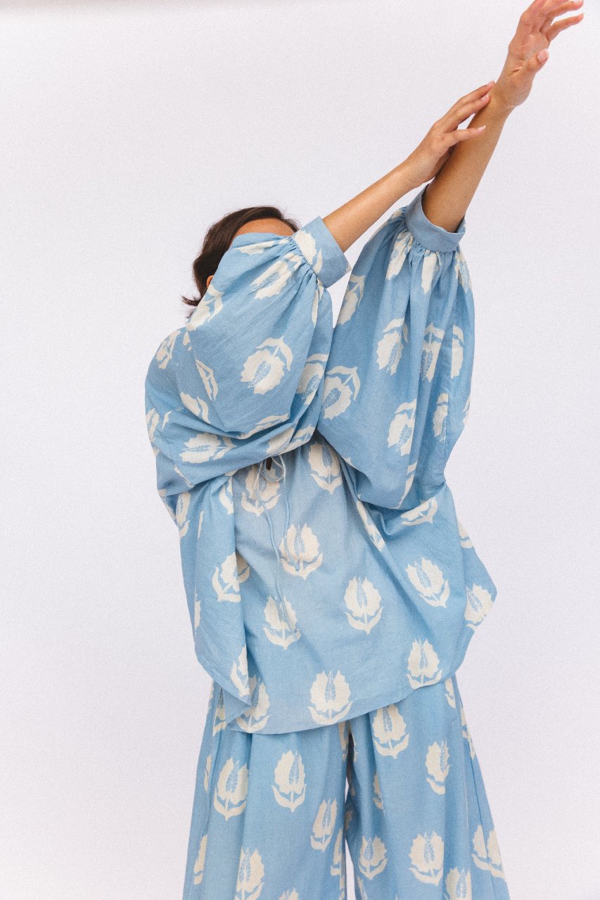 Ria Blouse Sky — styled full body look, model showing blouse with outfit, sky blue block print cotton top, artisan made India | Daughters of India